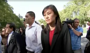 Linda_Sun_and_Chris_Hu_Leave_a_Courthouse_after_Being_Released_on_Bail_for_Offenses_Realted_to_Money_Laundering_and_Failing_to_Register_as_Foreign_Agents_The_Daily_Muck
