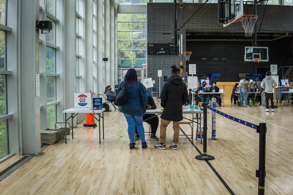 Poll_workers_direct_voters_at_a_community_center_in_the_Bronx_in_2020._Prosecutors_have_charged_Bronx_Board_of_Elections_District_Leader_Nicole_Torres_demanded_bribes_in_exchange_for_recommending_poll_workers_and_falsifying_timecards_The_DAily_Muck