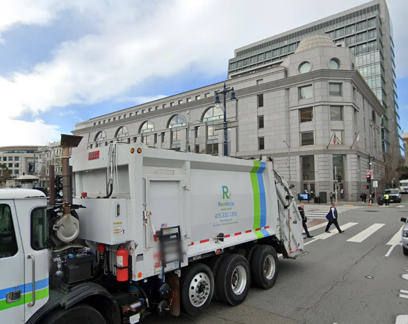 A dump truck sits in front of the San Francisco Civil Center Courthouse - The Daily Muck