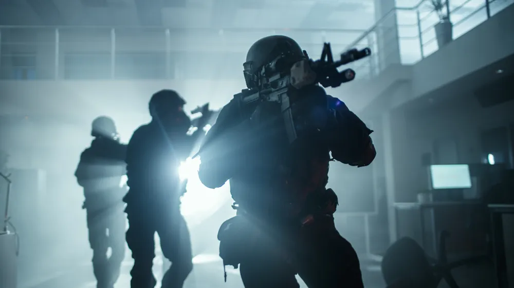 A SWAT Team in Fatigues Enter a Home Rifles Pointed Representing a Swatting Conspiracy that Targeted U.S. Citizens - The Daily Muck