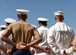 Navy Members Shown From Behind at Parade Rest Representing a New Finding of Fault Against a Navyt Commander for Reprisal