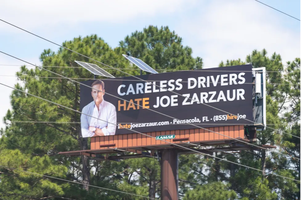 Billboard_lawyers_often_represent_motorists_involved_in_insurance_claims