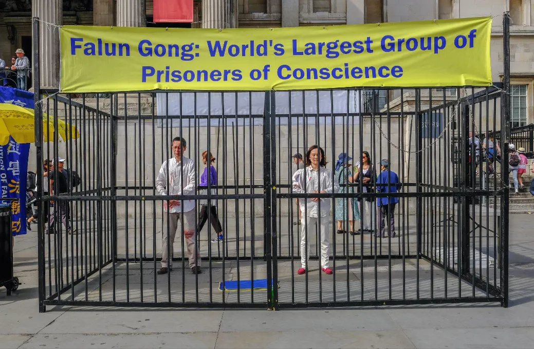 Falun_Gong_members_demonstrate_against_China_during_a_2018_protest_in_Trafalgar_Square_China_has_dispatched_agents_to_gather_information_on_the_Falun_Gong_religious_movement_according_to_the_US_Justice_Department