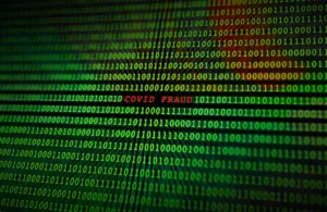 The_Red_Statement_Covid_Fraud_In_a_Series_of_Ones_and_Zeroes_Represent_a_Ring_of_Six_New_Yorkers_Who_Have_Been_Charged_with_Fraudulentlty_Filing_for_600_Million_in_COVID-19_Benefits